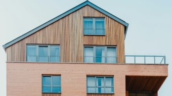 low-angle photo of brown house