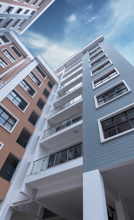 low-angle photo of blue building